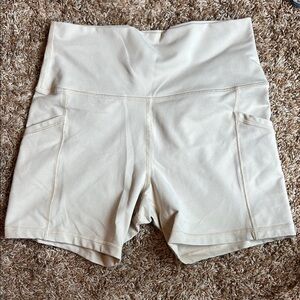 Offline by Aerie 5” Hugger Cream Pocket Bike Shorts
